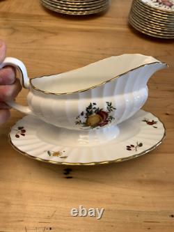 Delecta 12 piece China Set Circa 1800 Made in England Gold Rimmed Hand Painted